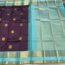 Gorgeous Dark Kanchana Brown with dual tone aqua blue green Handwoven Pure Jari Korvai Kanjivaram Silk Saree with Rich Peacock Buttas Woven body beautiful borders rich pallu with intricate motifs and contrast woven blouse