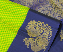 Vaibhogam- Stunning Parrot Green  with Deep Blue  Handwoven Pure Jari Korvai Kanjivaram Silk with beautiful muted checks woven body with gorgeous Hamsas woven on either side of the borders with beautiful rich paisleys wovepallu and contrast Blue blouse