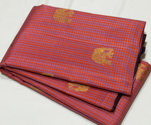 Saranga- Fantastic Borderless Handwoven Pure Jari Kanjivaram Silk in a beautiful pink and blue muted checked body with elephants motifs woven all over the body with rich deep brown pallu and contrast woven blouse