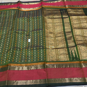 Gorgeous Forest Green with Double tone Orange 1000 Floral Buttas Handwoven Premium Kanjivaram Silkcotton Saree Beauty