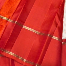 Sarasangi- Stunning Offwhite with Burnt Orange Checked Handwoven Pure Jari Korvai Kanjivaram Silk with beautiful doublepet borders rich pallu and contrast woven blouse