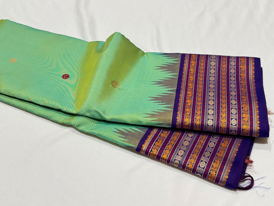 Pista Green with Violetish Blue Korvai with buttas Varisaipet Borders Handwoven Pure Zariless Kanjivaram Silk Saree Beauty