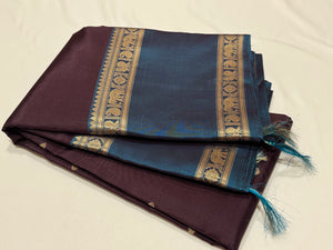 Deep Beetlenut Brown with Teal Blue Buttas with Doublepet Borders Handwoven Pure Jari Kanchipuram Silk Saree with Single Peacock Pallu Beauty