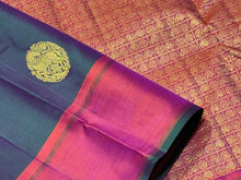 Dual tone Green Short with Orange Buttas Handwoven Pure Jari Kanjivaram Silk Saree with rich pallu and contrast woven blouse