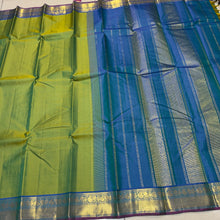 Nayaki- Gorgeous Parrot Green with Peacock Blue tone  Handwoven Pure Kanjivaram Silk with beautiful bawanchi borders with rich pallu and contrast woven blouse