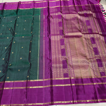 Sahana- Stunning Bottle Green with Dark Magenta Buttas Handwoven Pure 2g Jari Kanjivaram Silk with long and short beautiful borders with rich pallu and contrast buttas woven blouse