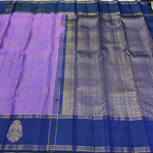 Sahana- Gorgeous December Poo Lavendar with Deep Peacock Blue Handwoven Pure Jari checked kanjivaram silk with buttas in the body with beautiful Gandaberundas woven either side borders rich pallu and contrast Jari striped blouse