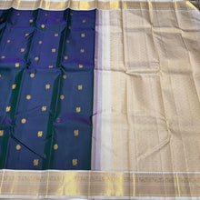 Stunning Deep Sapphire Blue (dual tone deep blue short with green) with Offwhite Handowen Pure Jari Korvai Kanjivaram Silk Saree with Mayil Chakram Buttas woven body with rich and very beautifully woven borders gorgeous pallu and contrast woven blouse