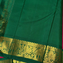 Sarasangi- Dual tone Rani Pink Short Tomato with Deep Emerald Green Handwoven Pure Korvai Kanjivaram Silk with rich borders gorgeous pallu and contrast woven blouse