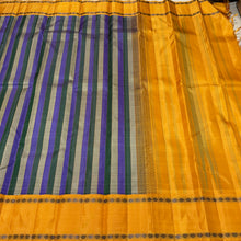 Saraswati- Gorgeous Lavendar Green and Grey with Golden Mustard Handwoven Premium Zariless Korvai Kanjivaram Silk with beautiful panel patterned body with rettapet rudrakshas woven borders rich seer pallu and contrast woven blouse