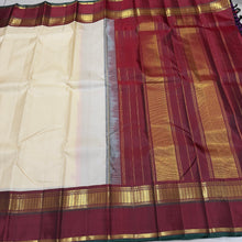 Sarasangi- Gorgeous Creamish White with Deep Brown Handwoven Pure Jari Korvai Kanjivaram Silk with beautiful borders green selvedges rich pallu and contrast woven blouse