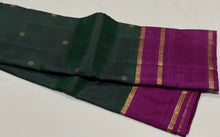 Sahana- Stunning Bottle Green with Dark Magenta Buttas Handwoven Pure 2g Jari Kanjivaram Silk with long and short beautiful borders with rich pallu and contrast buttas woven blouse