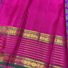 Sahana-Stunning Double tone Blue Green body with striped purple and green lines with gorgeous veldhari striped rettapet borders rich pink seer pallu and contrast woven blouse