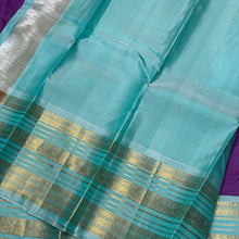 Vaibhogam- Gorgeous Medium Lavendar with Turquoise Blue Handwoven Pure Jari Korvai Buttas Woven Kanjivaram with Rich Varisaipet Borders Beautiful Pallu and Contrast Woven Blouse