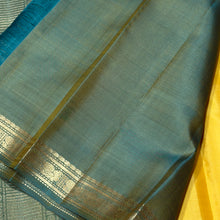 Sahana- Gorgeous Golden Yellow with Dual tone Green Buttas Handwoven Pure Kanjivaram Silk with small beautiful borders rich pallu and contrast woven blouse