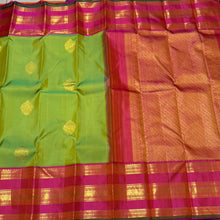 Sneha Green with Dual shade Orange Handwoven Pure Jari Korvai with Buttas Kanjivaram Silk Saree Broad Varisaipet Borders Beauty