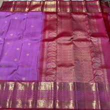 Lilac with Onion Pink Handwoven Pure Jari Kanjivaram Silk Saree with Silver Mayil Chakram motifs in body and rich borders in golden jari with beautiful pallu and contrast woven blouse