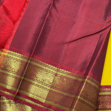 Vaibhogam -Stunning Yellow with Burgundy and BottleGreen Handwoven Pure Jari Korvai Kanjivaram Silk with silk buttas woven beautiful body with rich Gandaberundas woven ganga jamuna borders on both sides with rich pallu and contrast blouse