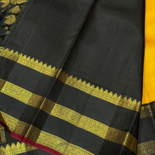 Vaibhogam- Stunning Yellow with Black Handwoven Pure 2g Jari Korvai with Buttas Kanjivaram Silk with beautiful triplepet borders with maroonish red selvedges rich pallu and a beautiful contrast black blouse