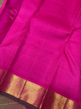 Sahana-Beautiful Dual tone Manthulir Green with Rani Pink Combo in a Handwoven Pure Kanjivaram Silk with Neli Veldhari Striped Body with beautiful mayilkan borders with green selvedges rich seer pallu and contrast woven pink blouse