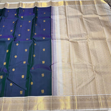 Stunning Deep Sapphire Blue (dual tone deep blue short with green) with Offwhite Handowen Pure Jari Korvai Kanjivaram Silk Saree with Mayil Chakram Buttas woven body with rich and very beautifully woven borders gorgeous pallu and contrast woven blouse