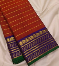 Sahana- Stunning  Burnt Orange with Purple Handwoven Pure Jari Kanjivaram Silk with Jari Veldhari Body with rich borders pallu and contrast woven blouse