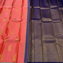 Saranga- Beautiful Peach with Navy Blue Borderless Handwoven Pure Jari Kanjivaram Silk with Muthukattam and Paisleys with peacock and annapakshi Buttas woven body with rich pallu and contrast navy blue blouse!