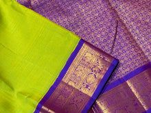 Sneha Green with Violetish Purple Korvai Handwoven Pure Jari Kanjivaram with intricate borders rich pallu and contrast woven blouse beauty