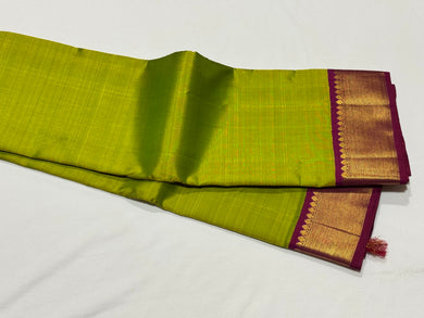 Beautiful Green Sampanga with Deep Maroonish Magenta Handwoven Pure Jari Korvai Kanjivaram Silk Saree with rich borders pallu and contrast woven blouse