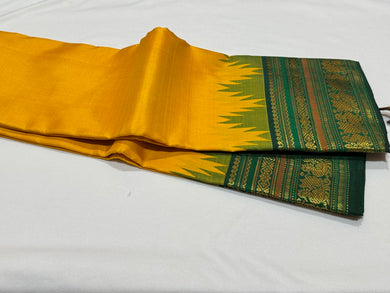 Yellow with Bottle Green Handwoven Pure Jari Korvai Kanjivaram Silk Saree Beauty with temples woven rich borders