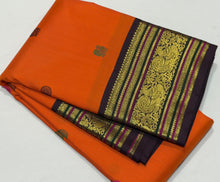 Vaibhogam- Mesmerizing Orange with Deep Coffee Brown Pure2g Jari handwoven Kanjivaram Silk with beautiful pattu buttas woven body with beautiful meenakari work woven rich borders and pallu and contrast woven beautiful blouse