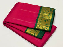 Sarasangi- Dual tone Rani Pink Short Tomato with Deep Emerald Green Handwoven Pure Korvai Kanjivaram Silk with rich borders gorgeous pallu and contrast woven blouse
