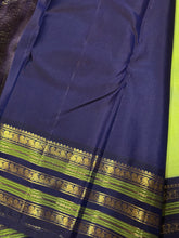 Gorgeous Pastel Green with Navy Blue Handwoven Pure Jari Korvai Plain Body Kanjivaram Silk Saree with rich Varisaipet Meenakari Borders Rich Pallu and Contrast Woven Blouse