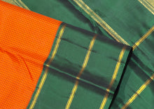 Sarasangi- Orange with Bottle Green Handwoven Pure Jari Korvai Kanjivaram Silk with podikattam woven body beautiful borders rich seer pallu and contrast woven blouse