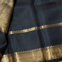 Sahana-Gorgeous Black with Gold Handwoven Pure Kanjivaram Silk with Thematic rettai yazhis and iruthalaipakshis (gandaberundas) motifs woven rich double side borders with beautiful annapakshis and yazhis woven rich pallu and self blouse