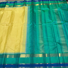Sarasangi- Stunning Lemon Yellow with Aqua Green Blue Shade with Temple Spaced Borders Handwoven Pure Jari Korvai Kanjivaram Silk with rich seer pallu and contrast woven blouse. A super gorgeous piece for this wedding and festival season