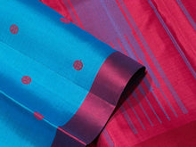 Nayaki- Beautiful Ananda Blue with Red Handwoven Pure Zariless Kanjivaram Silk with lovely banarasi pet matte finish borders with silk thread buttas rich pallu and contrast red blouse