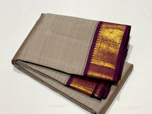 Sarasangi-Gorgeous Abirami with Deep Purple Handwoven Pure Jari Korvai Kanjivaram Silk with beautiful yazhi and annapakshi woven borders rich pallu and contrast woven blouse