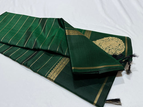 Vintage Recreation- Bottle Green with Gold Veldhari Striped body with double elephants and yazhis woven borders Handwoven Pure Jari Kanjivaram Silk Saree Beauty