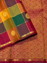 Saranga- Gorgeous Palum Pazhamum Checks With rudrakshapet borders with beautiful paisleys and chakram buttas woven body with neli veldhari horizontally and vertically checked body with rich arakku pallu and contrast beautifully woven blouse