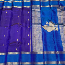 Violetish Blue with Lapis Blue Handwoven Pure Korvai Kanjivaram Silk Saree with Buttas Body Doublepet Borders rich Simhayazhi Pallu and Contrast Blouse