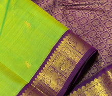 Vaibhogam-Beautiful Parrot Green with Deep Purple Handwoven Pure 2g Jari Korvai with Small Bird Buttas woven Kanjivaram Silk with rich borders gorgeous pallu and contrast woven blouse