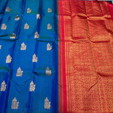 Peacock Blue with Red Borderless Muthukattam with Buttas woven body in a gorgeous Handwoven Pure Jari Kanjivaram Silk Saree with rich pallu and contrast woven blouse beauty