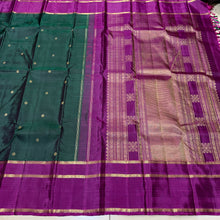 Sahana- Stunning Bottle Green with Dark Magenta Buttas Handwoven Pure 2g Jari Kanjivaram Silk with long and short beautiful borders with rich pallu and contrast buttas woven blouse