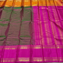 Sahana- Gorgeous Dual tone Manthulir with Golden Mustard and Rani Pink Ganga Jamuna Rettapet  Borders  Handwoven Pure Jari Kanjivaram Silks with Neliveldhari striped body with rich buttas woven beautiful pallu and contrast pink blouse.