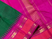 Sarasangi-Stunning Bottle Green with Rani Pink Handwoven Pure Jari Korvai Kanjivaram Silk with Fishpet Borders with temples woven with rich seer pallu and contrast woven blouse.