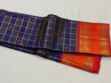 Vaibhogam-Gorgeous Deep Blue Orange Red Handwoven Pure Zari Kanijivaram Silk with rich jari checks and meena buttas woven beautiful body with rich borders pallu very intricately woven and contrast woven blouse