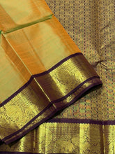 Sarasangi- Gorgeous Dual tone Green shot with mustard body with deep brown combination in a handwoven Pure Jari Korvai Kanjivaram Silk with beautiful borders rich pallu and contrast woven blouse