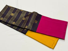 Vaibhogam- Stunning Deep Kanchana Blackish Purple with Yellow and Rani Pink Combination with Vairaoosi and middle thick strips where mayil chakram motifs are woven with beautiful broad ganga jamuna borders with rich pallu and contrast vairaoosi blouse