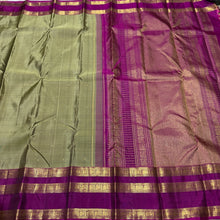 Sarasangi- Stunning Elaichi Green with Deep Magenta Buttas Handwoven Pure 2g Jari Korvai Kanjivaram Silk with beautiful doublepet borders rich woven pallu and contrast woven blouse